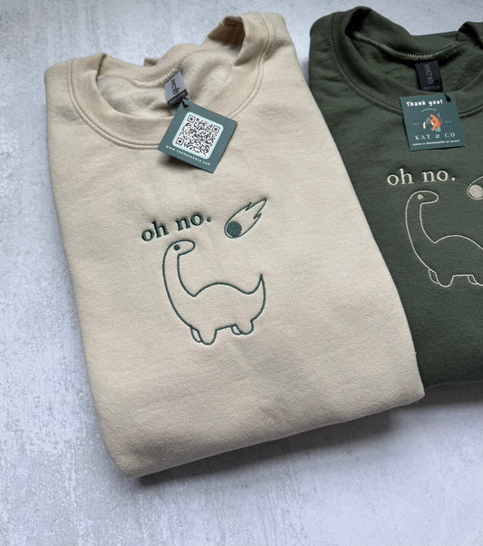 "oh no." Dinosaur Embroidered Sweatshirt | Funny Minimalist Dino with Meteor | Dark Humor Gift for Adults